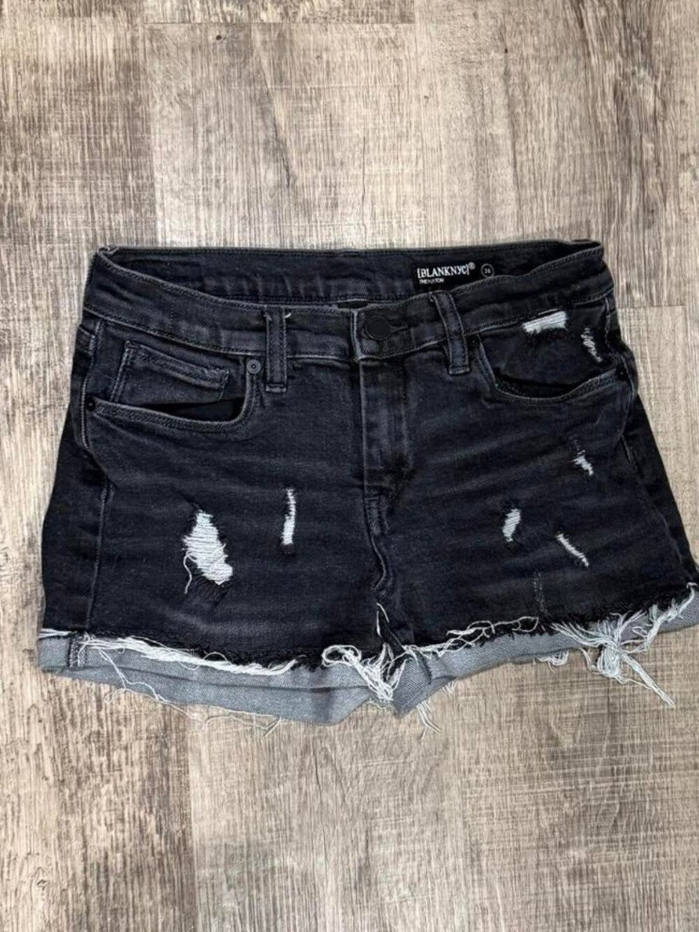 Blank NYC black denim shorts with distressed details, size 26